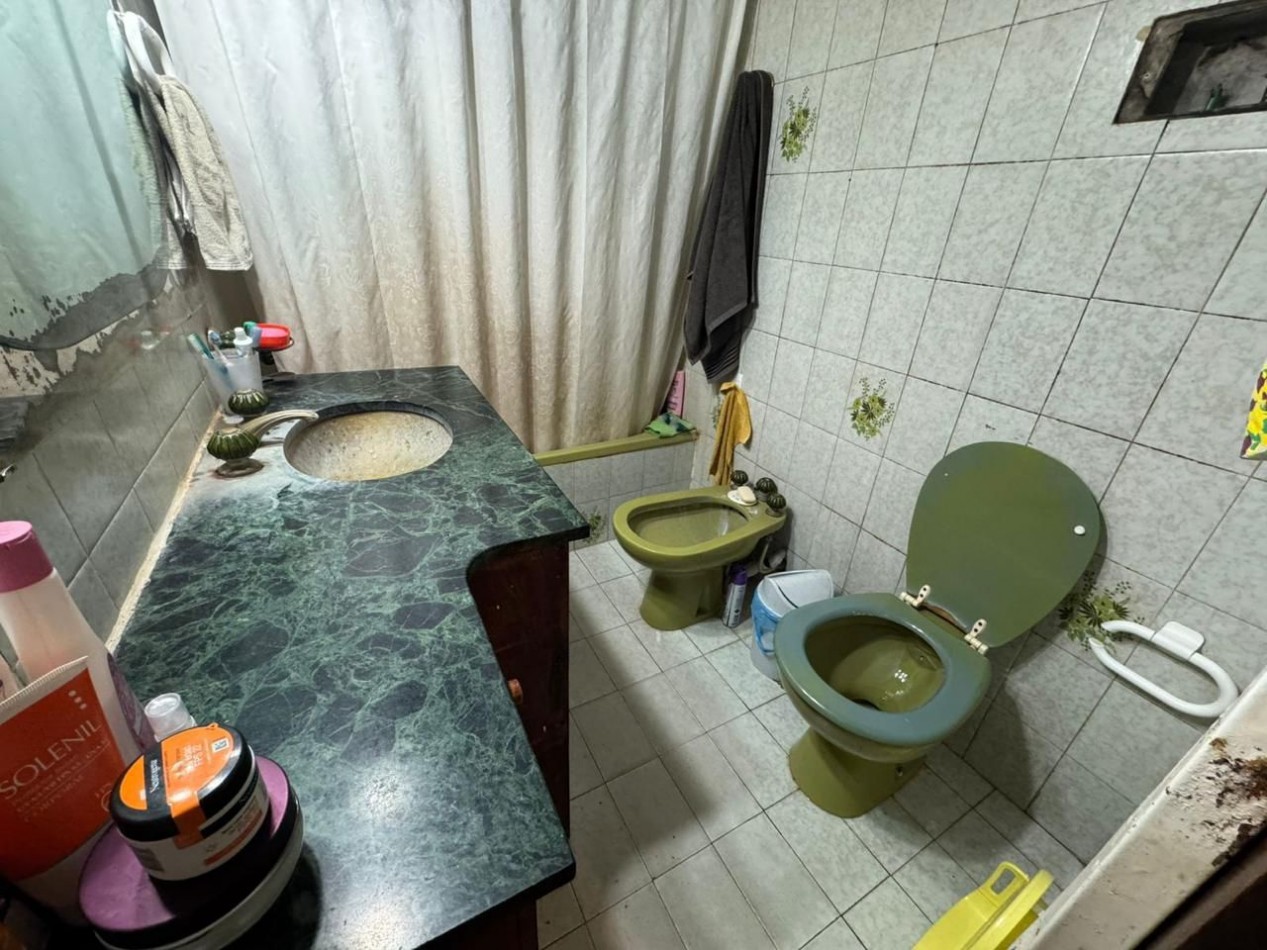 CHALET 4 AMBIENTES CON GARAJE Y QUINCHO SOBRE LOTE DE 234M2 EN VILLA LOURDES