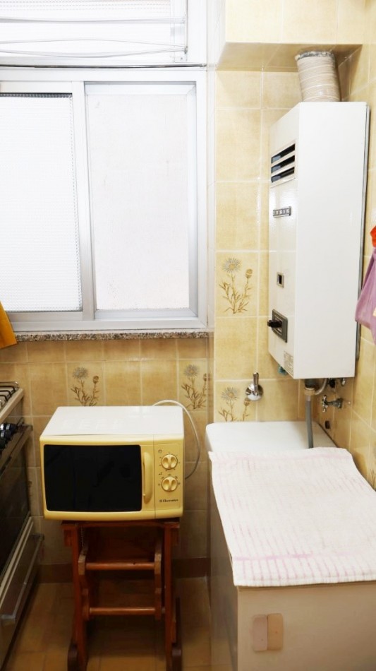 RETASADO: IMPECABLE SEMIPISO 3 AMBIENTES SOBRE PEATONAL SAN MARTIN. OPCION COCHERA 